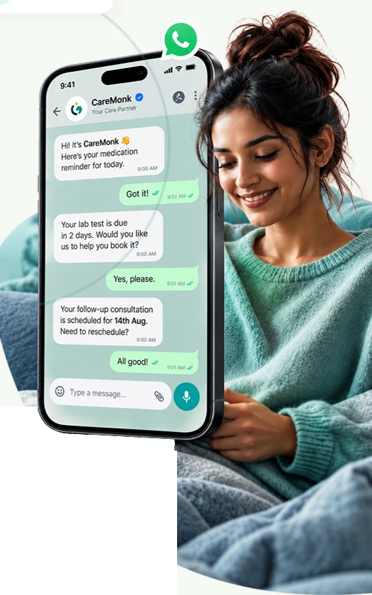 A smiling patient at home using the CareMonk WhatsApp assistant for medication and lab test reminders